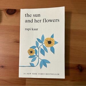 The Sun and Her Flowers Paperback Book by Rupi Kaur